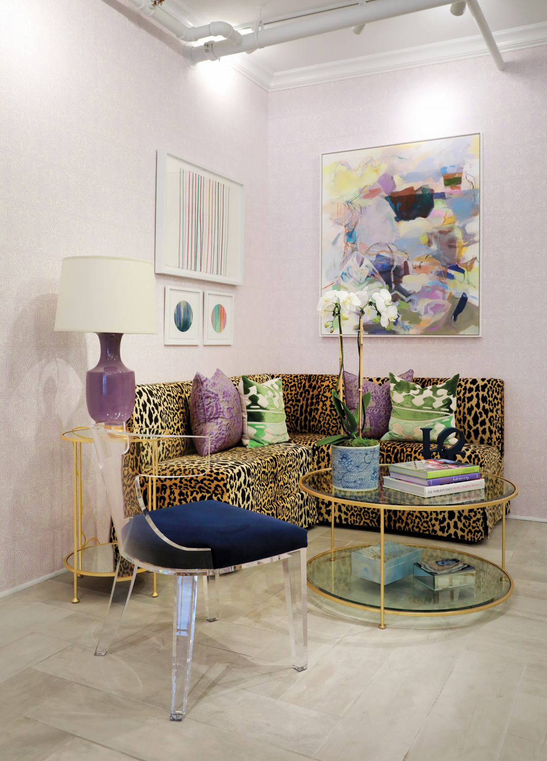 Boutique with leopard-print sofa and purple wallcovering
