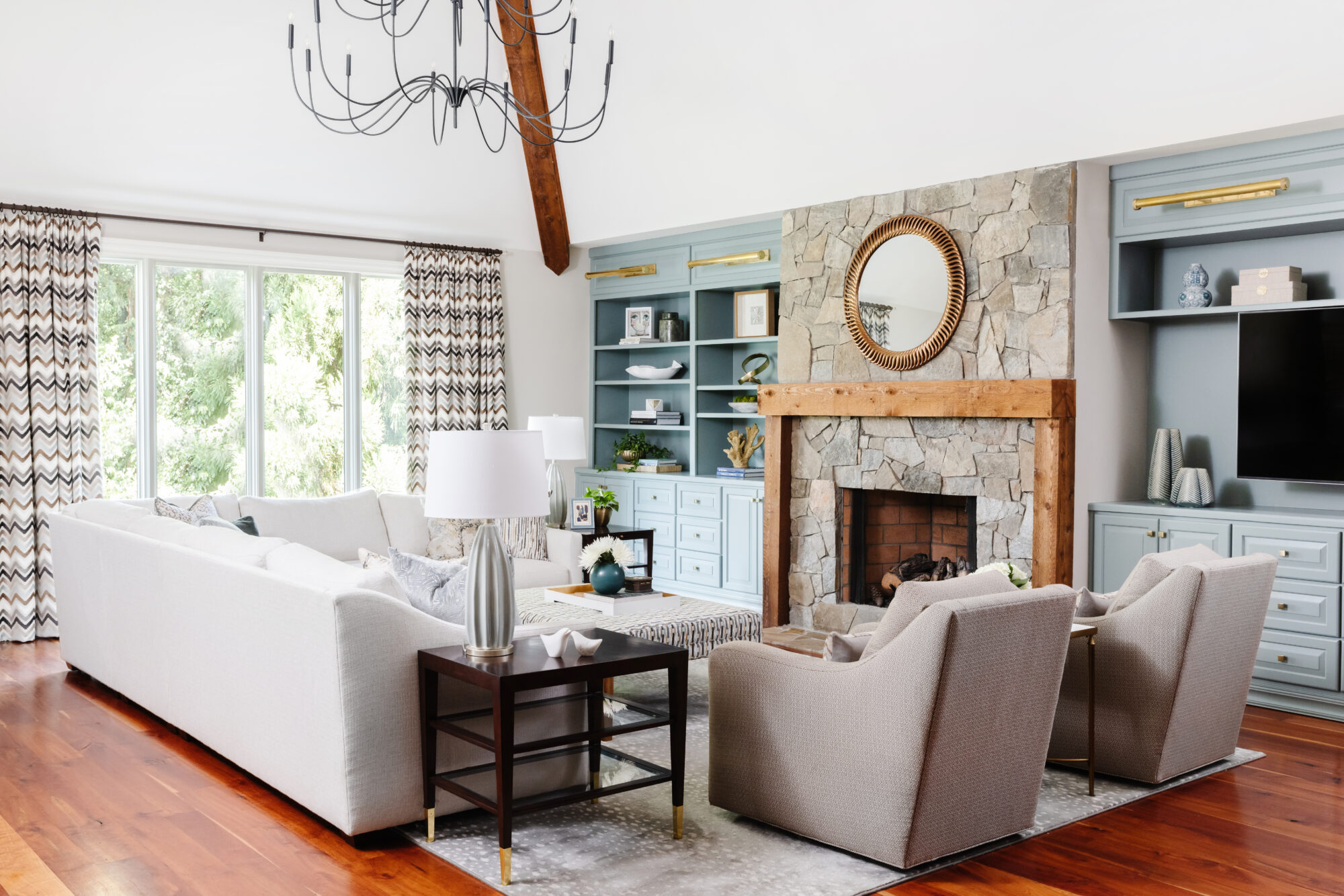 neutral gray living room with built ins in Van Courtland Blue by Benjamin Moore