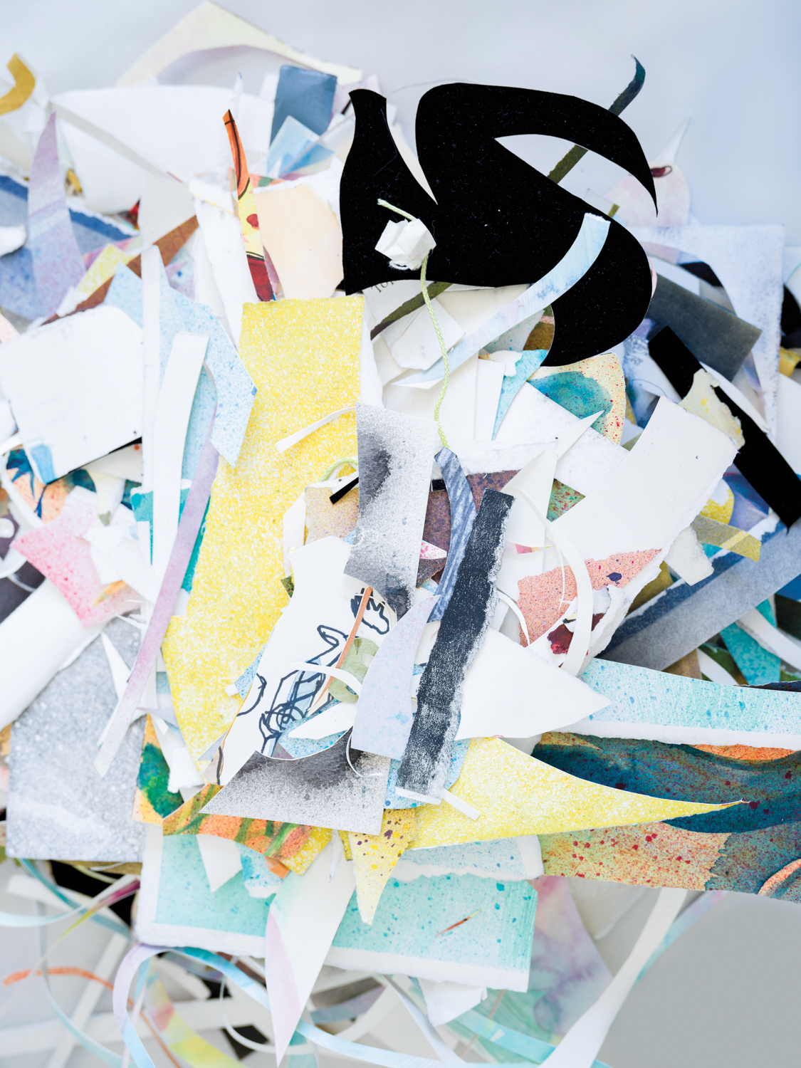 A pile of different-colored paper scraps.