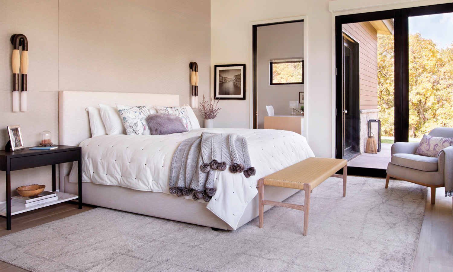 warm neutral master bedroom with...