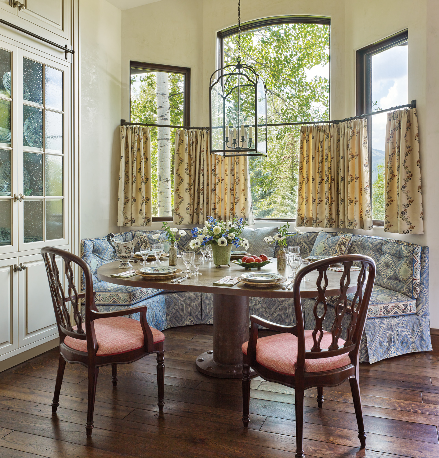 upholstered fabric breakfast nook with...