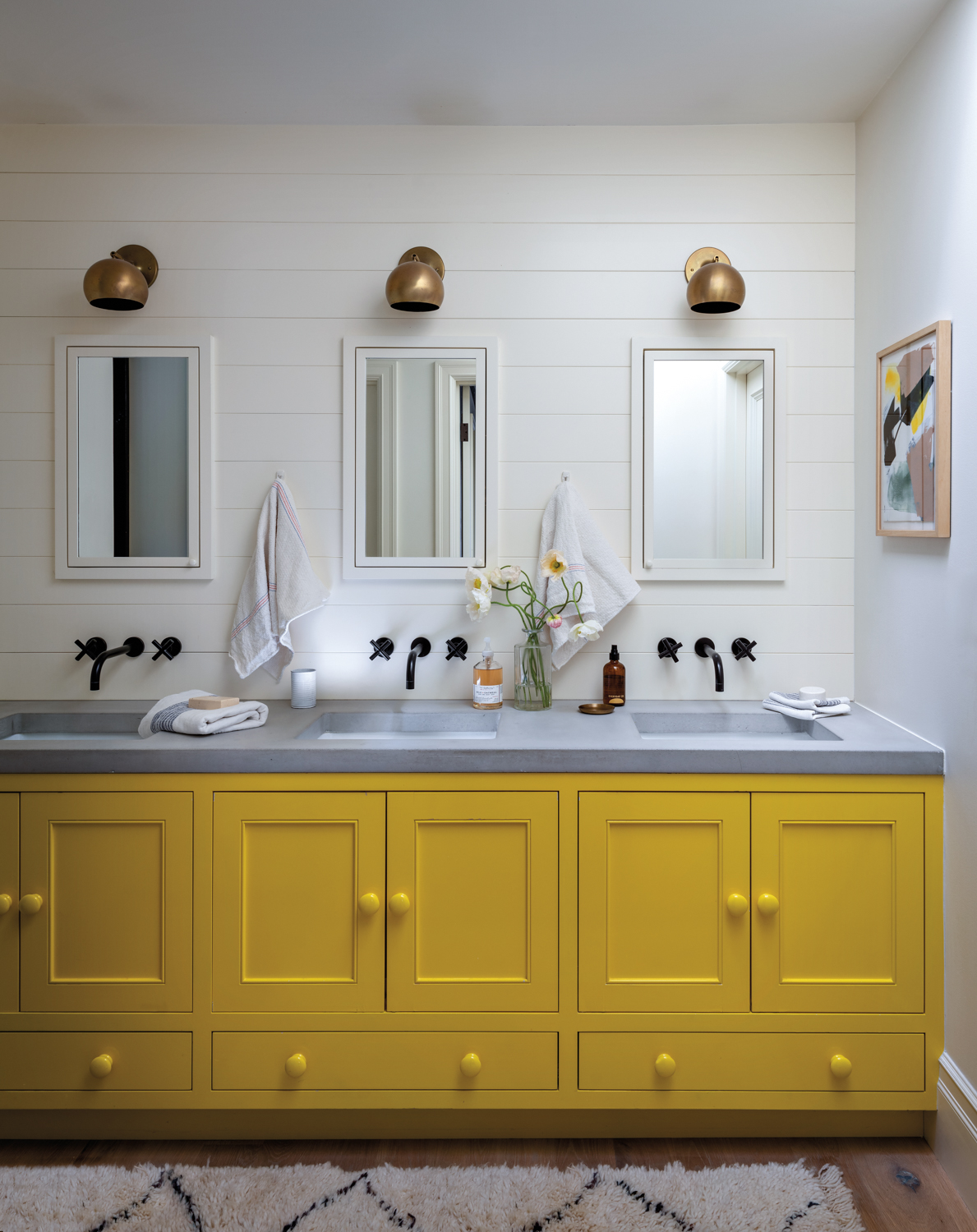 bright yellow painted vanity in...