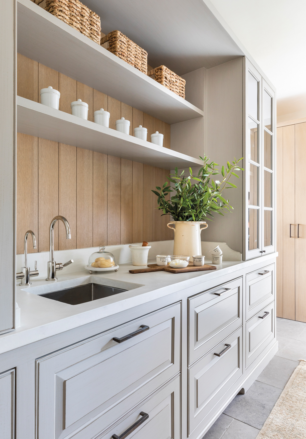 butler's pantry with gray cabinetry