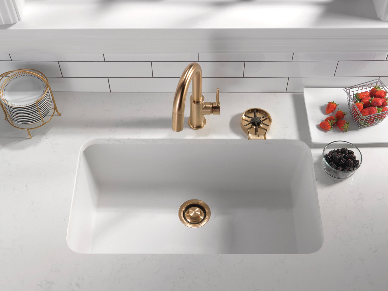 White sink with gold fixtures