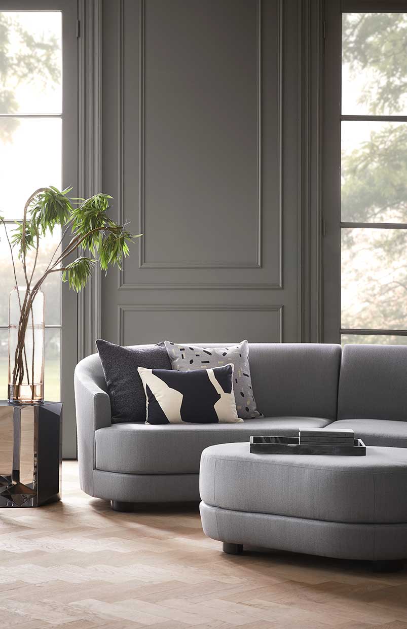 gray cloud couch in living room donghia