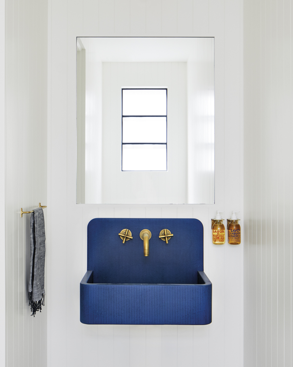powder room with bright blue...