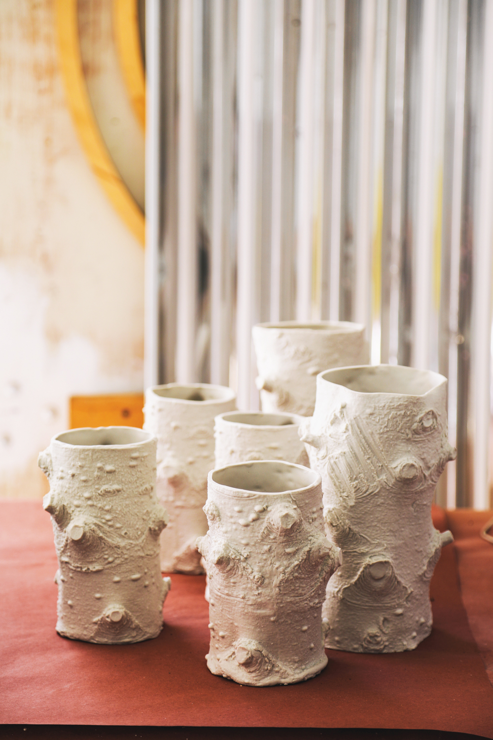 series of white cast vases