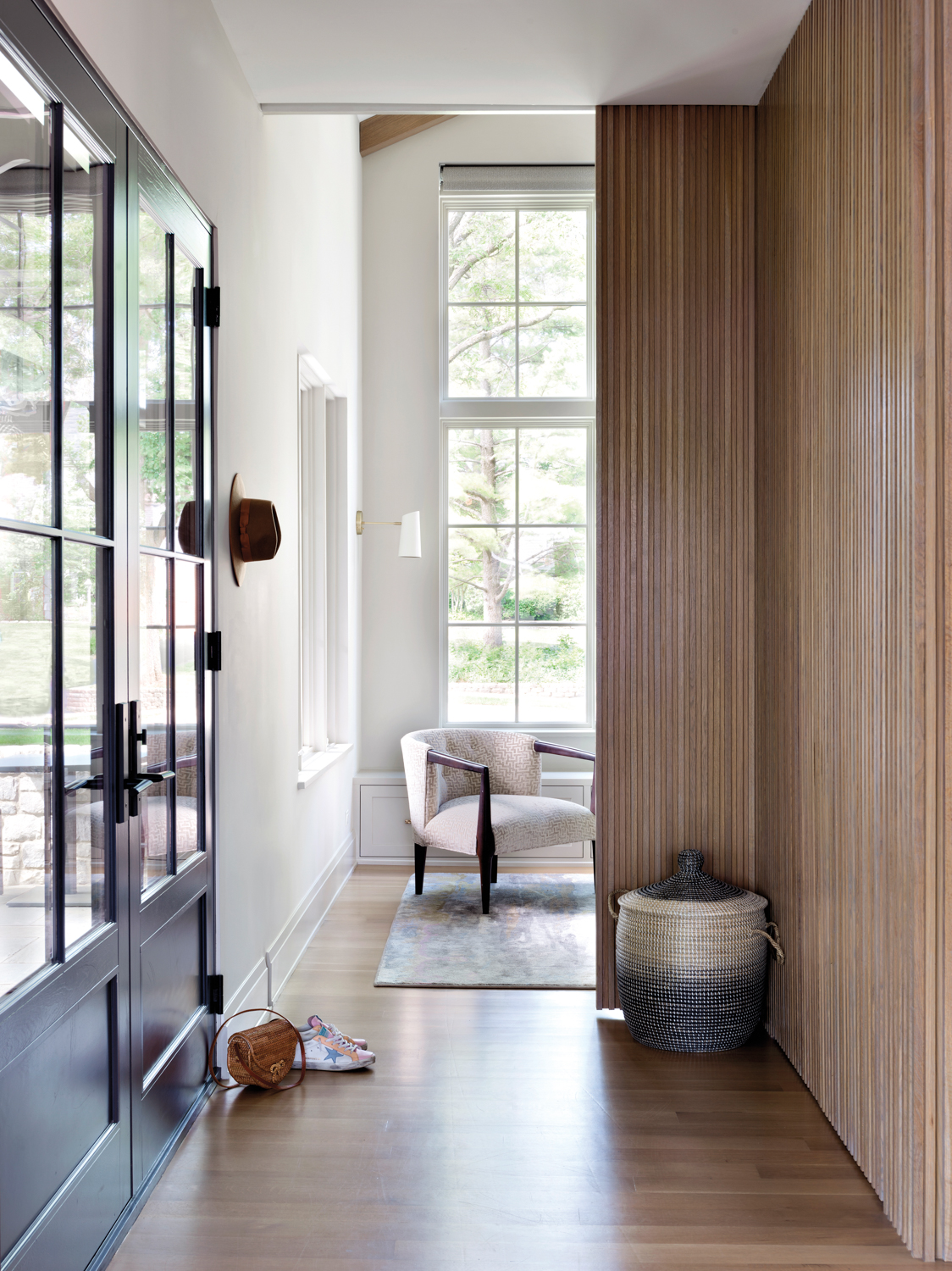 A wood paneled wall in...