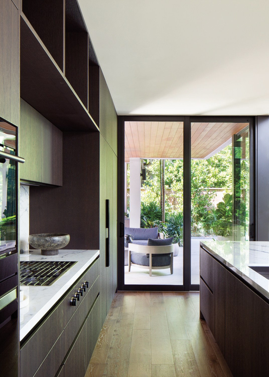 minimalist kitchen with white oak...