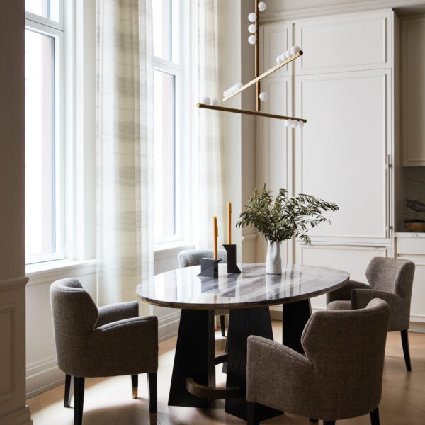 Lean Into The Posh Palette Of Neutrals Of This Tribeca Pied-à-Terre marble-topped dining table with black oak legs and brass accents