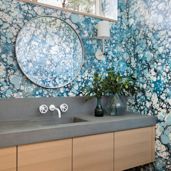 See How Classic Cottages Inspired This Modern Oregon Home modern powder room features a boldly patterned wall covering