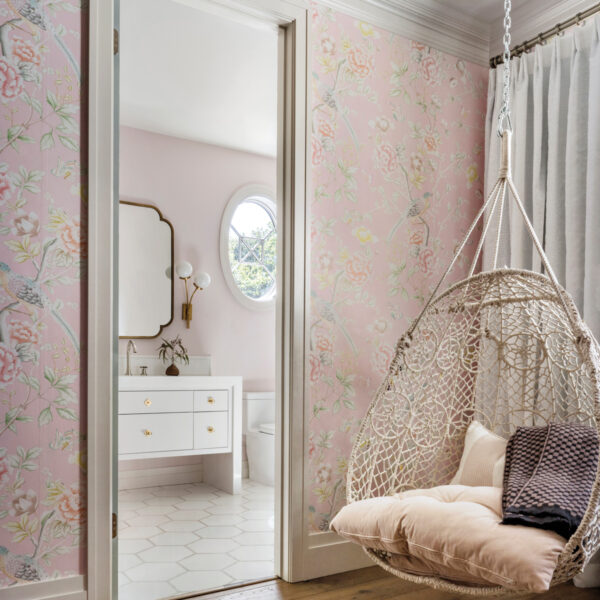 Inside A Soirée-Ready Bay Area Home With A Dazzling Entryway Pink bedroom with Anthropologie hanging chair