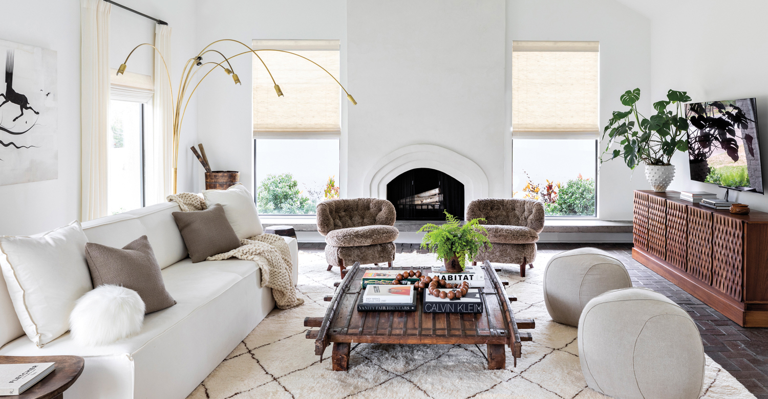 living room with a light and airy feel and mix of boho and vintage furnishings