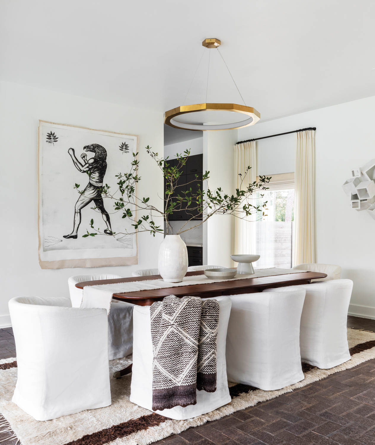 Dining room with neutral furnishings...