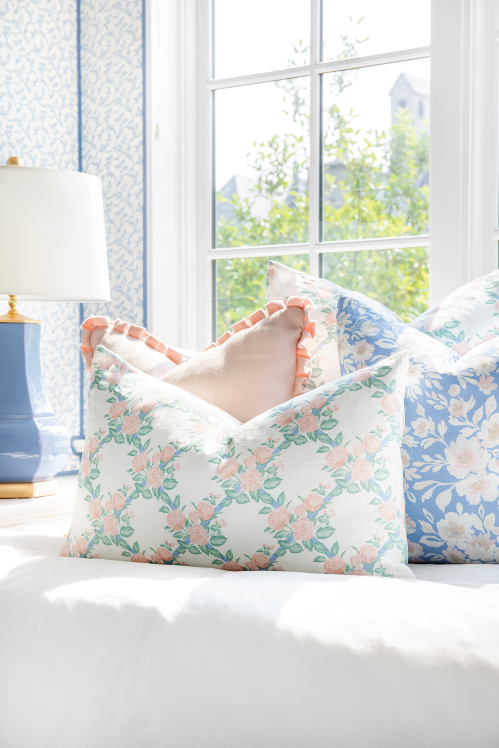 array of patterned pillows from the Grand-Mère Collection by Caitlin Wilson