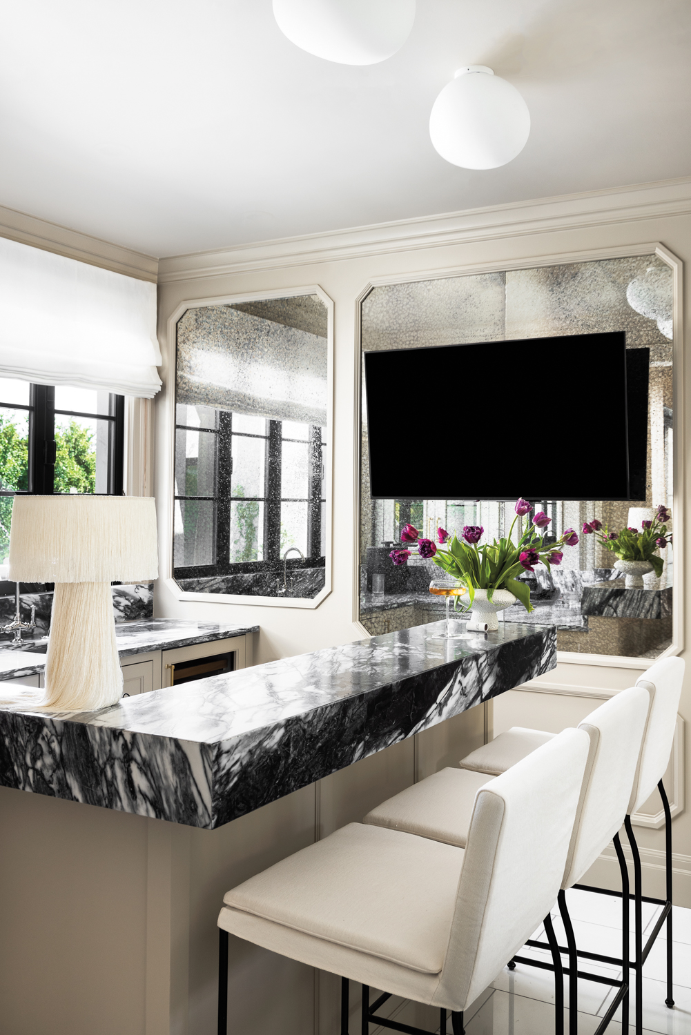 A black-and-white marble bar with...
