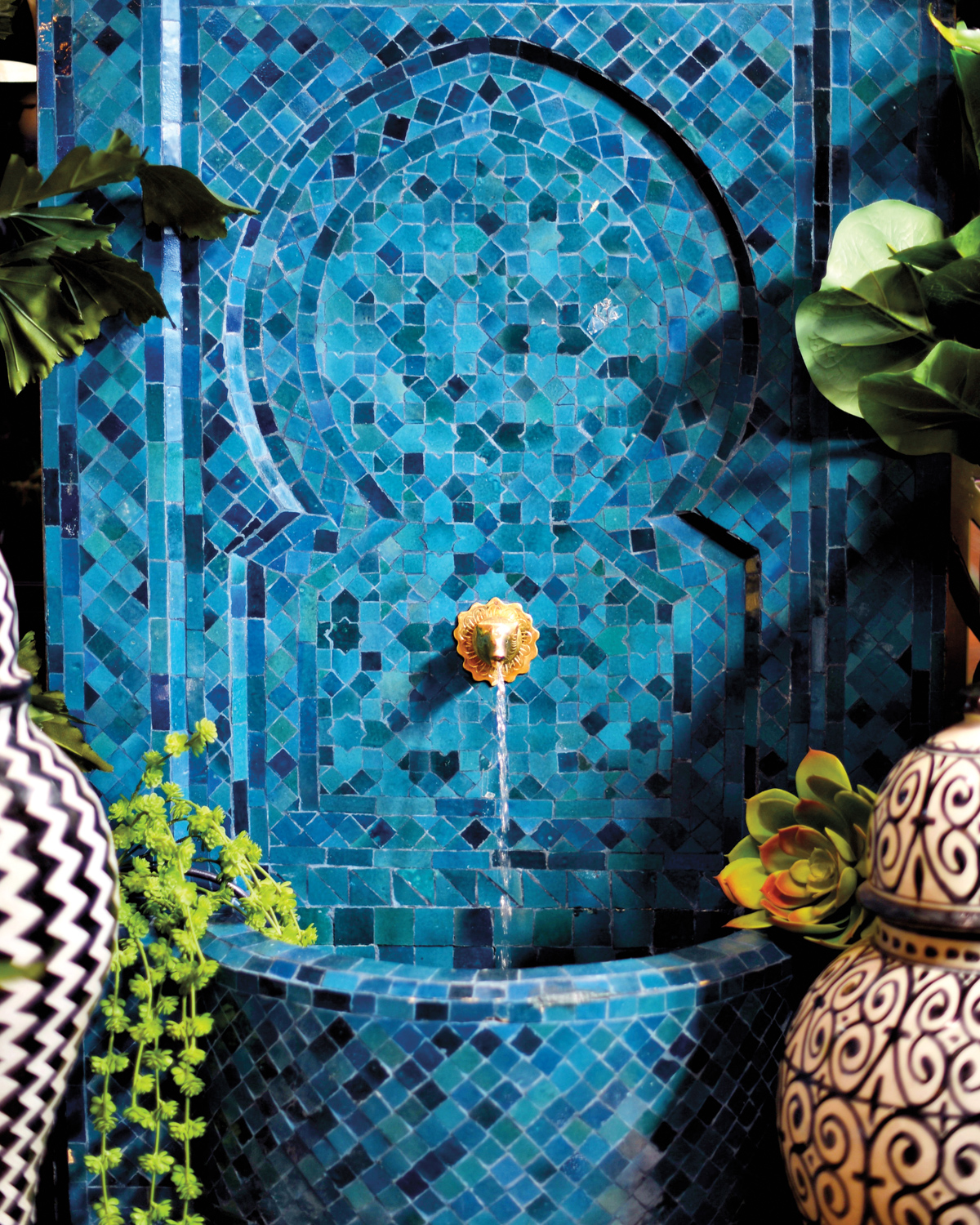 Blue mosaic tile fountain.