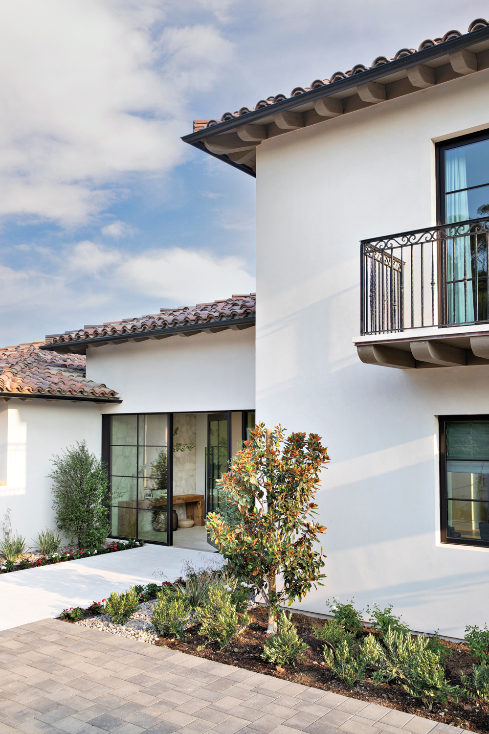 San Diego home with tiled roof and simple ironwork that nods to a Mediterranean influence