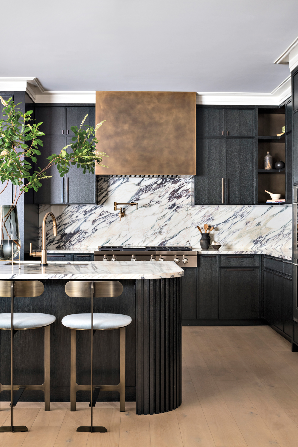 black kitchen with calacatta marble
