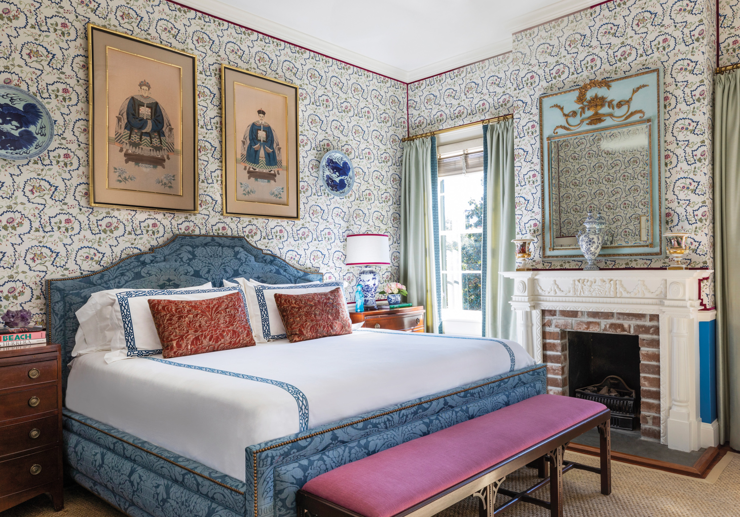 Bedroom with traditionally patterned wallpaper,...