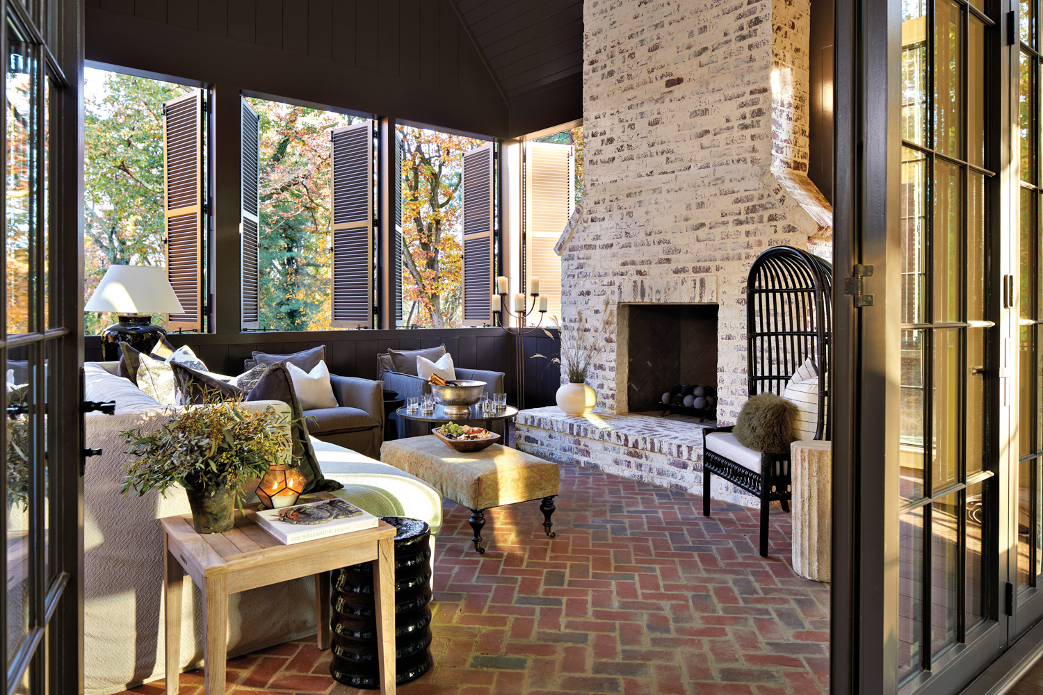 Covered brick porch with a...