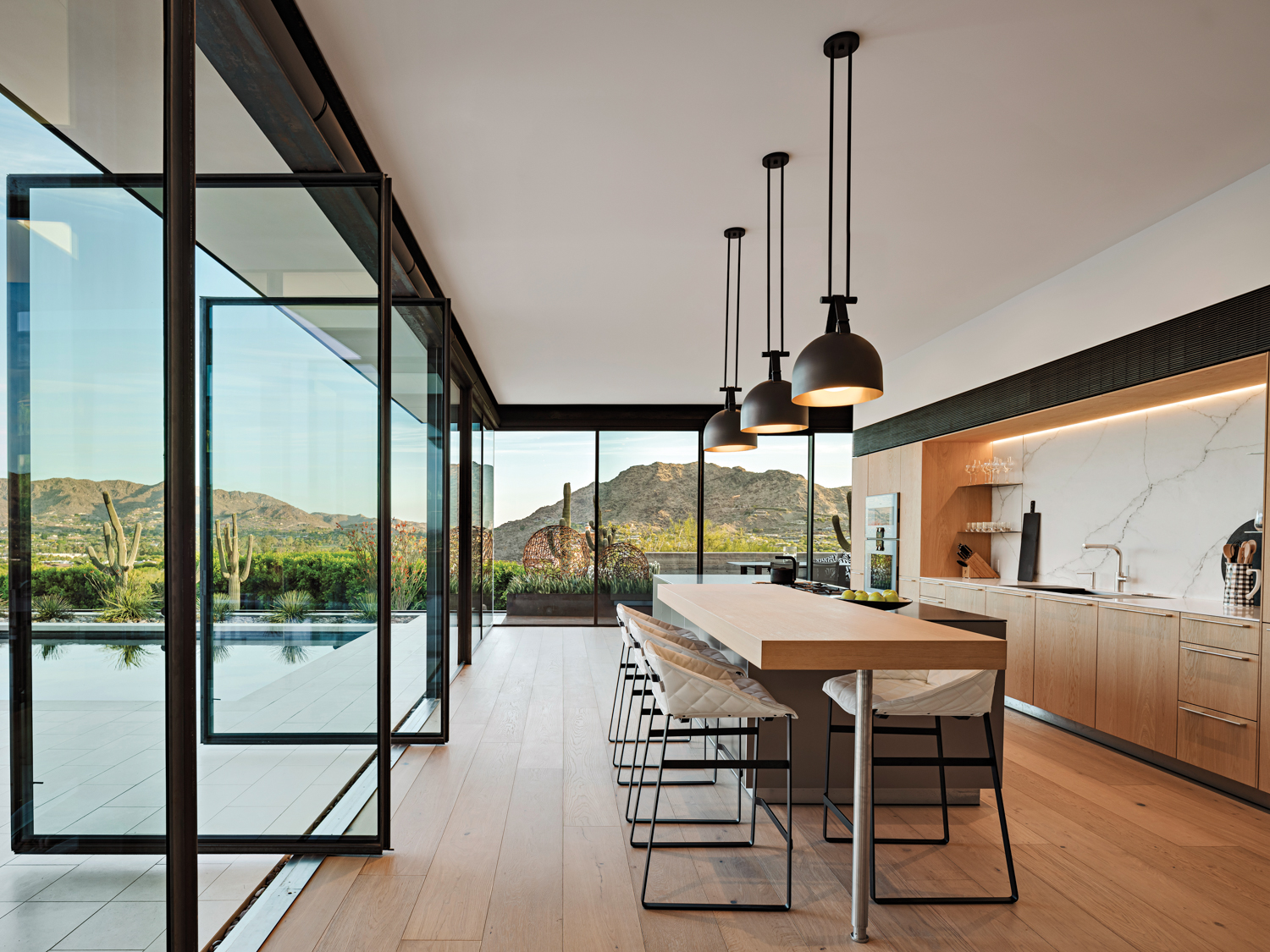 A modern kitchen with pivoting...