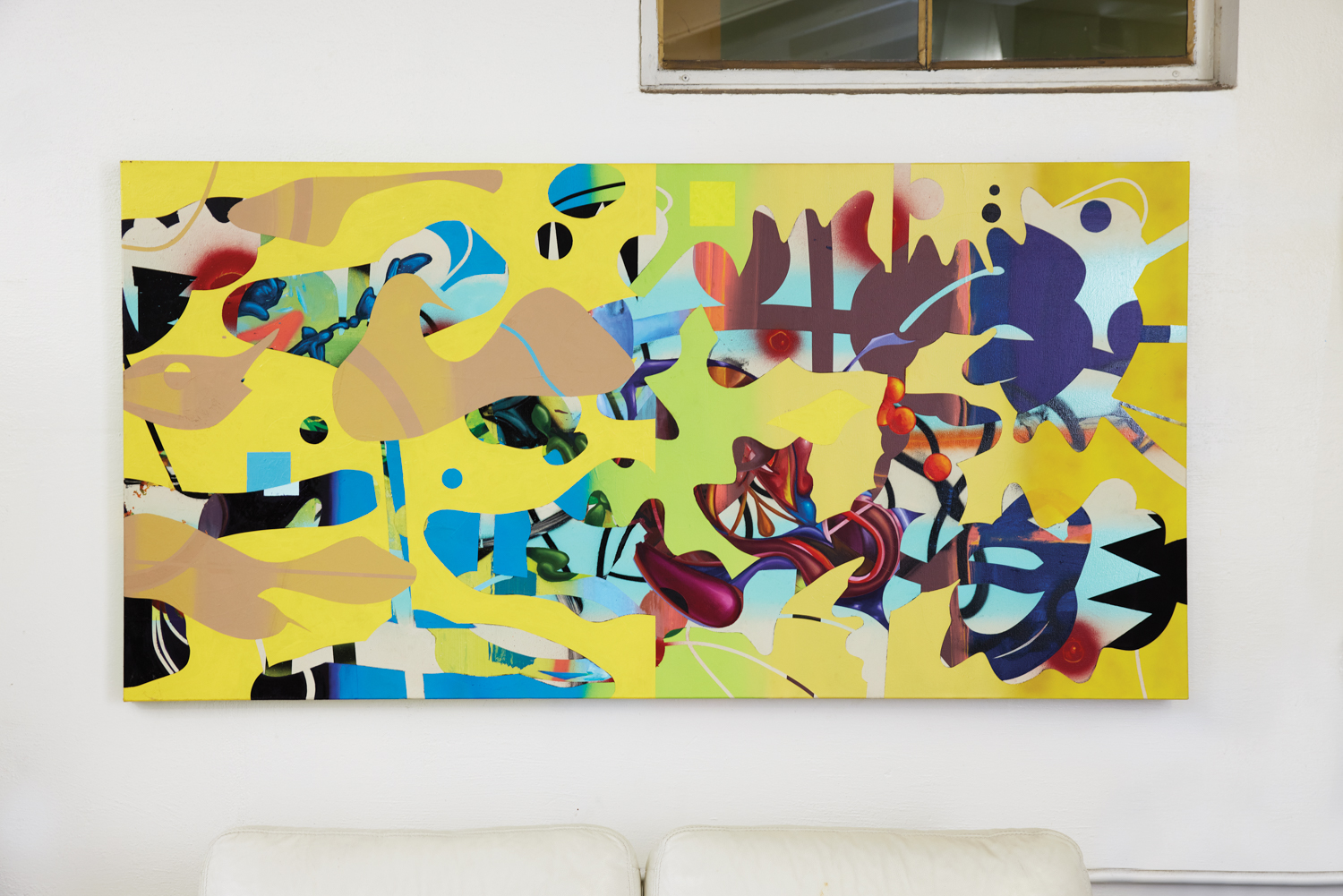 A multi-colored abstract painting with a yellow background.