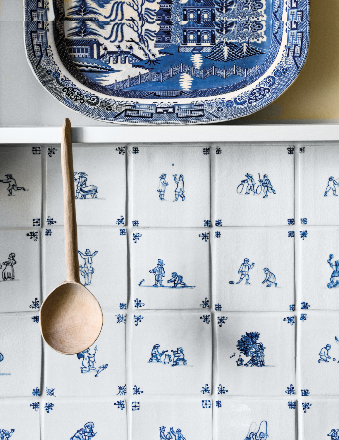 blue and white delft by plain english in a kitchen