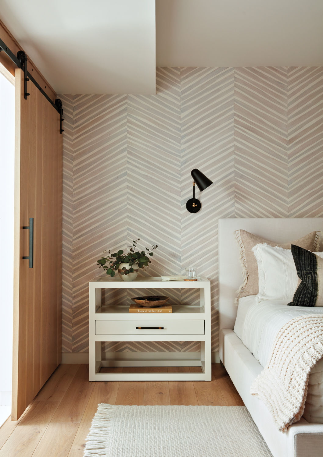 bedroom with grasscloth chevron print...