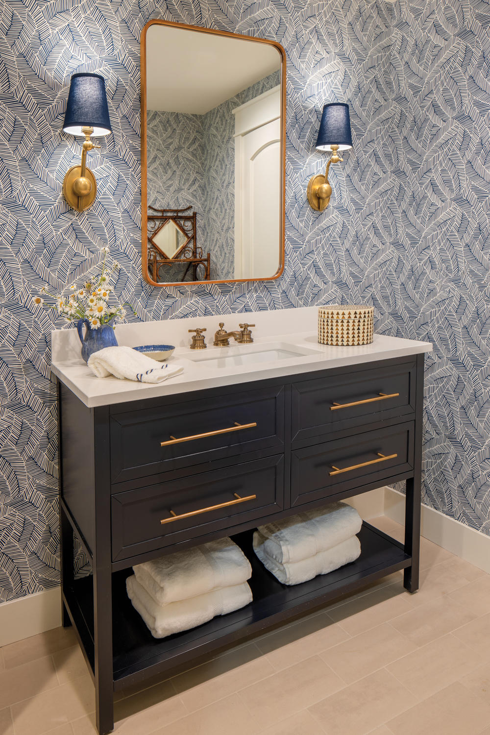 A powder room with blue...
