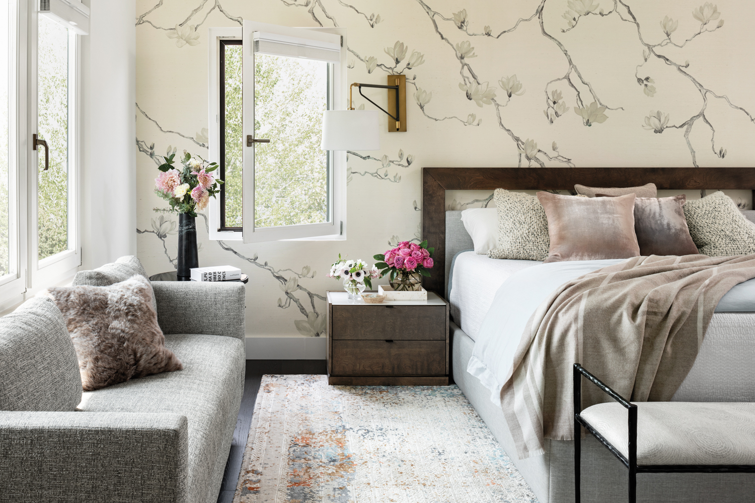bedroom with blossom wallpaper, a...