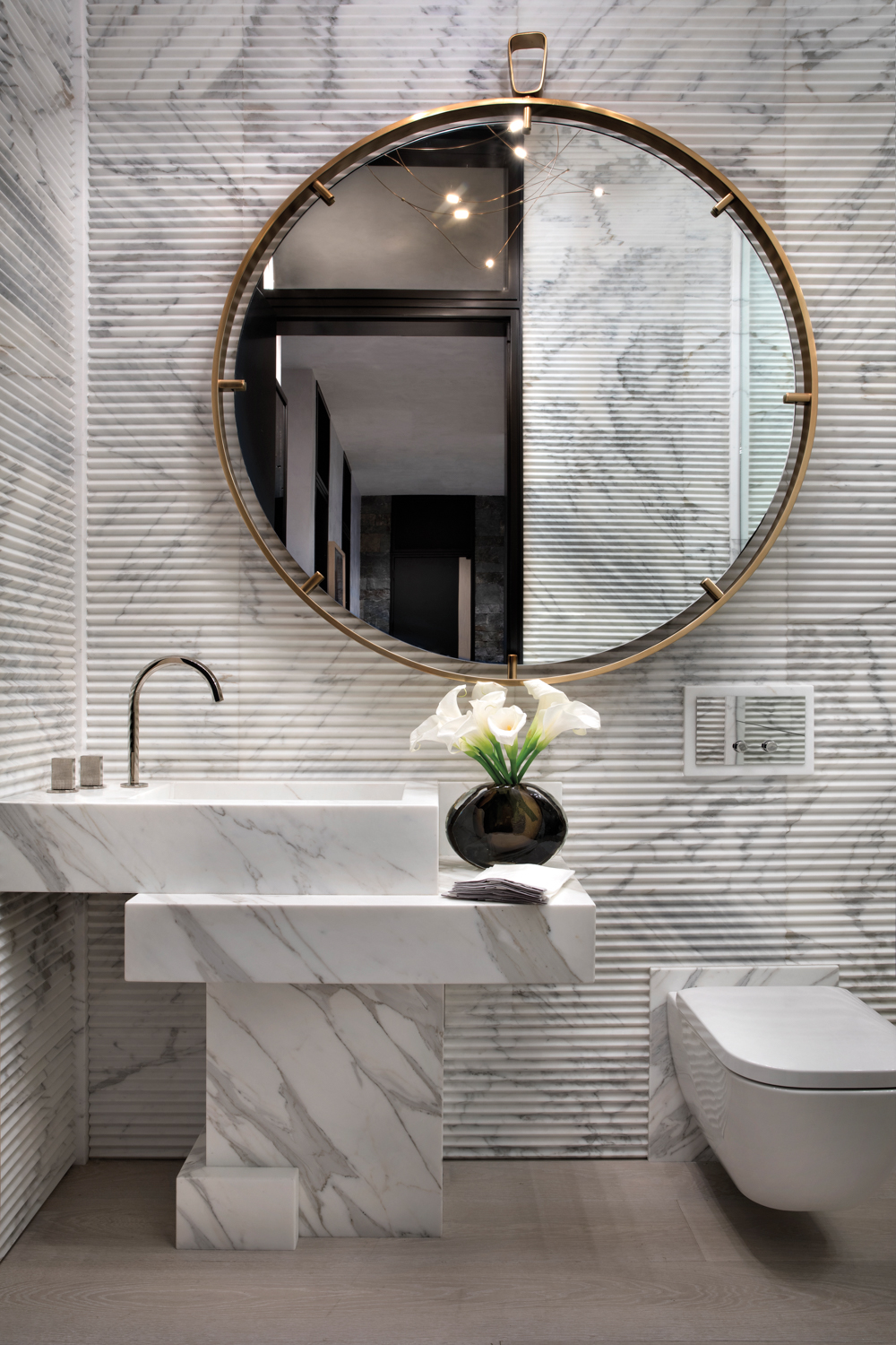 Bathroom with marble tile.