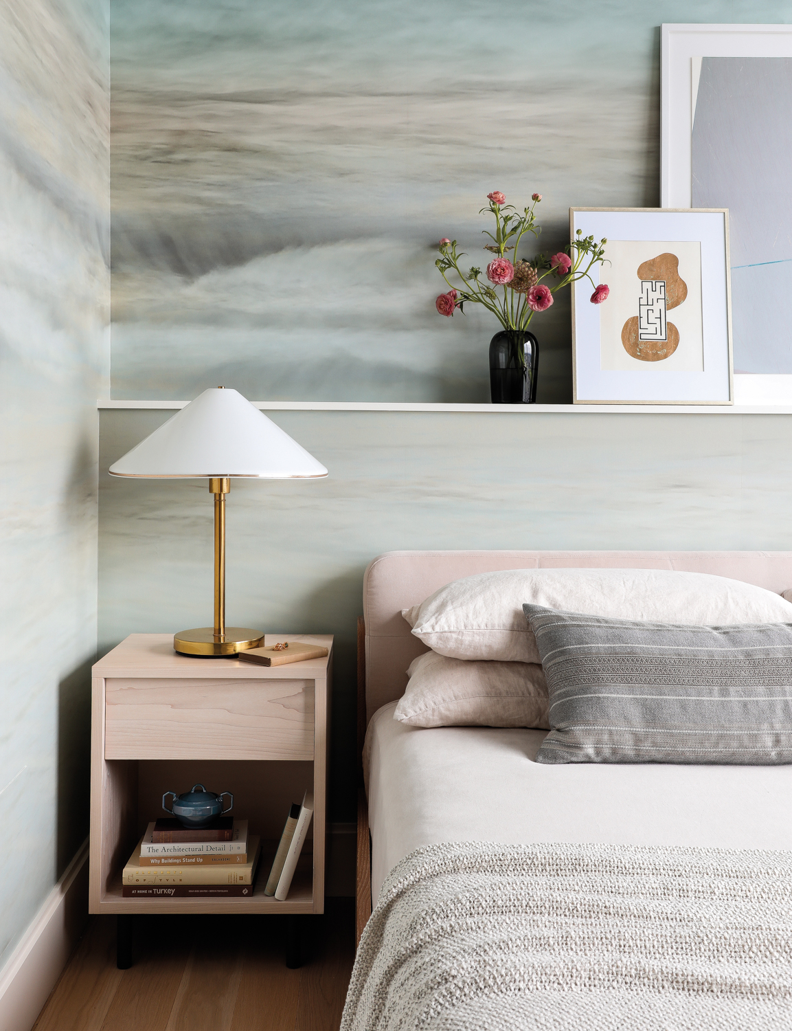 A bedroom has a wave-patterned...