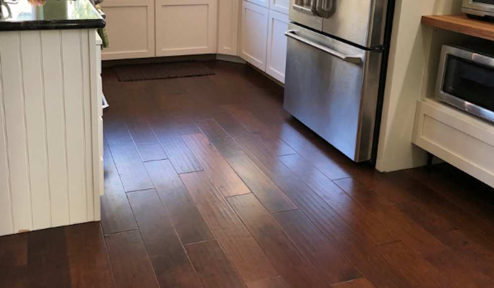 premium hardwood floors and custom cabinets in a kitchen by Floortex Design
