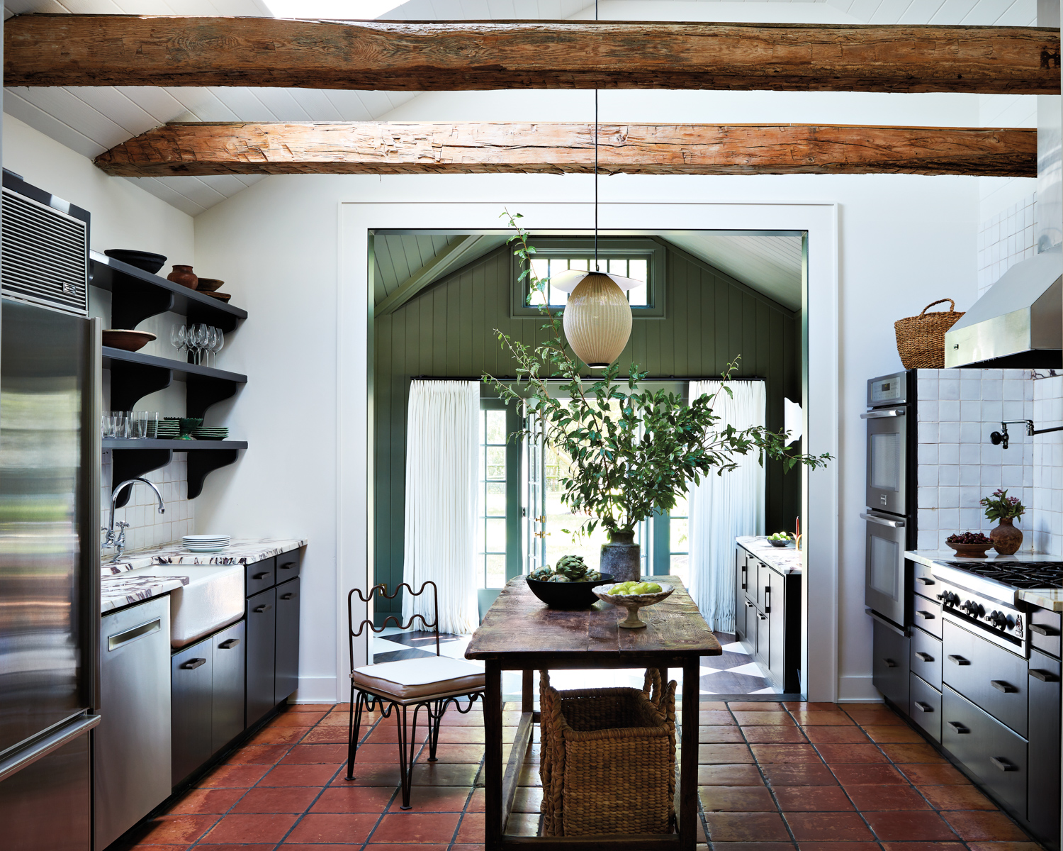 kitchen with wooden table and...