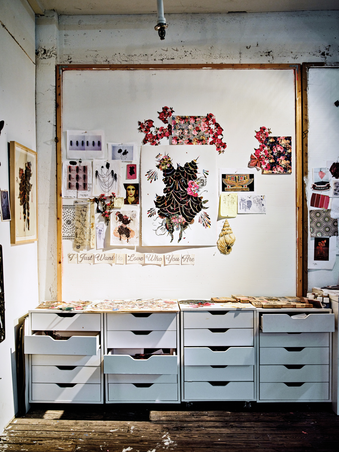 vignette of artwork and drawers in vickie pierre's studio