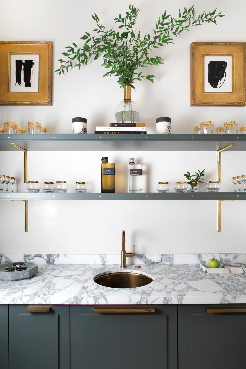 A stylish wet bar featuring...