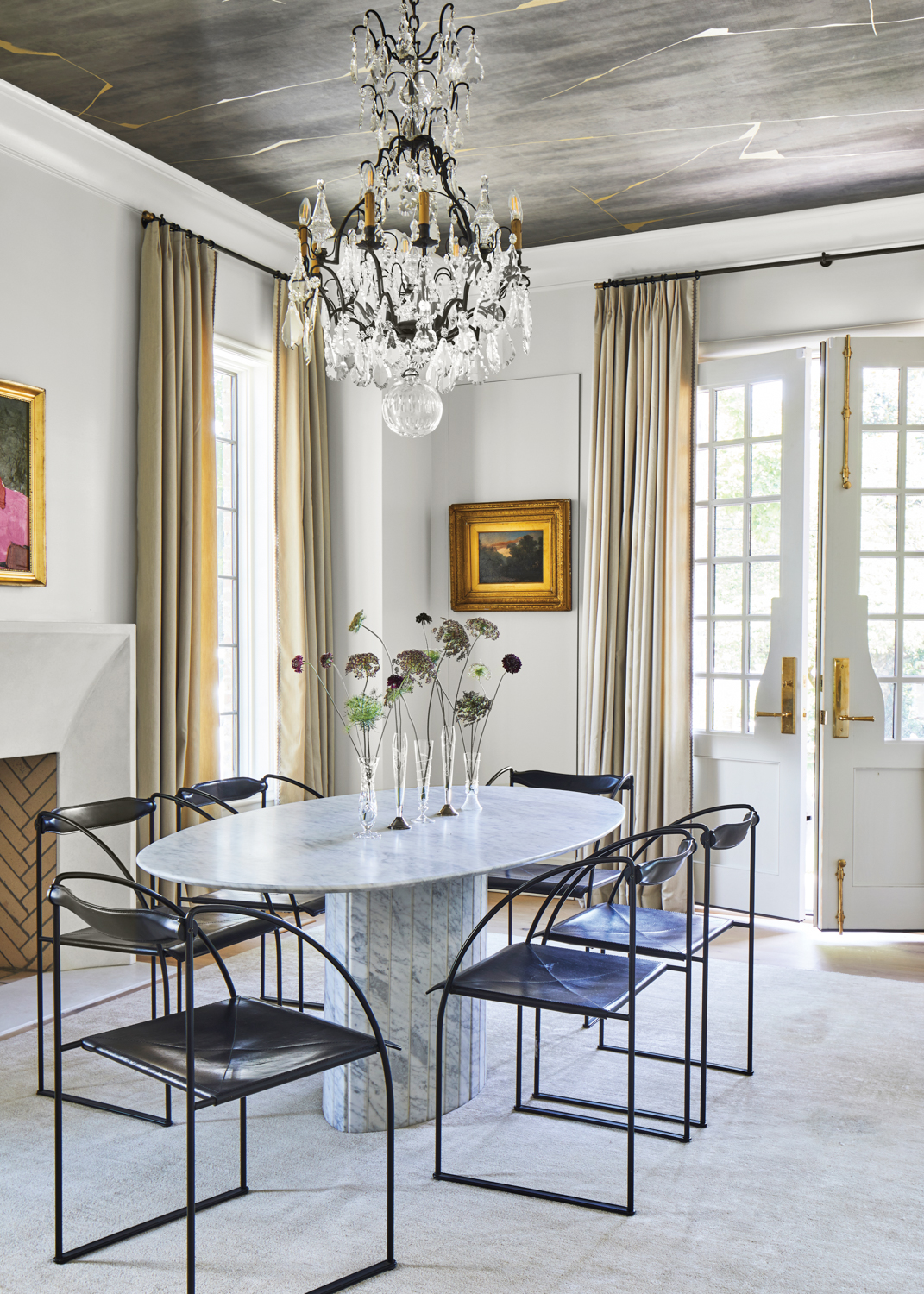 Glamorous dining room featuring an...