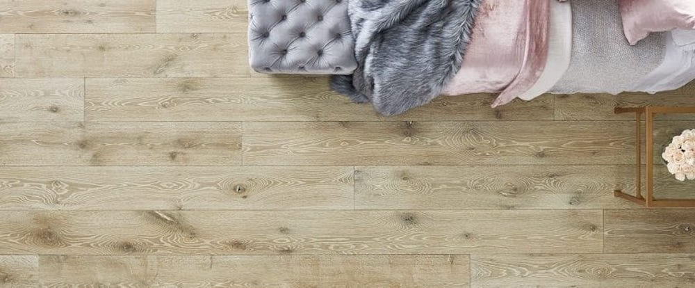 Handcrafted fine wood floors in bedroom by Carlisle Wide Plank Floors