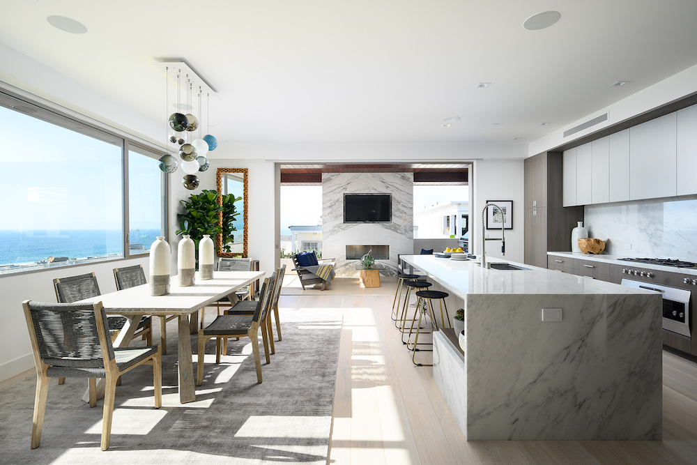 grey marble countertop in Kitchen with Manhattan Beach, California views interior design by Noelle Interiors