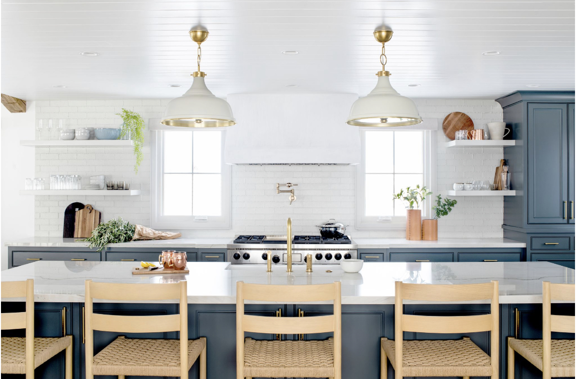 blue island and cabinets contrast the while in this kitchen project