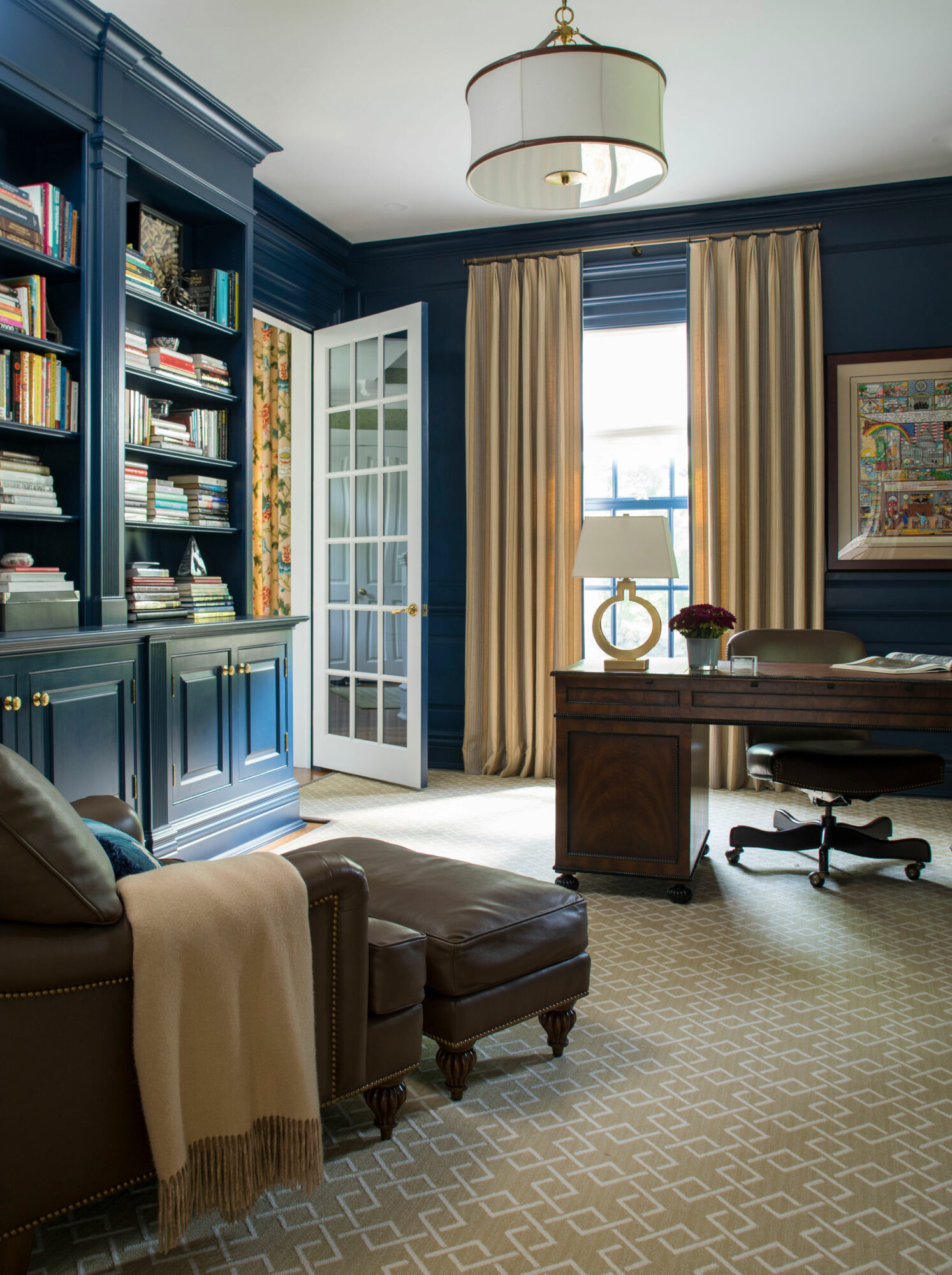 the marriage of brown and blue is a color trend for 2023 as it's displayed in a home office
