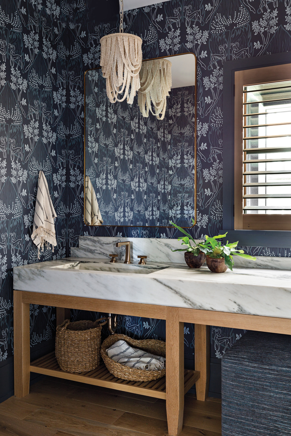 Powder room with blue-and-white floral...