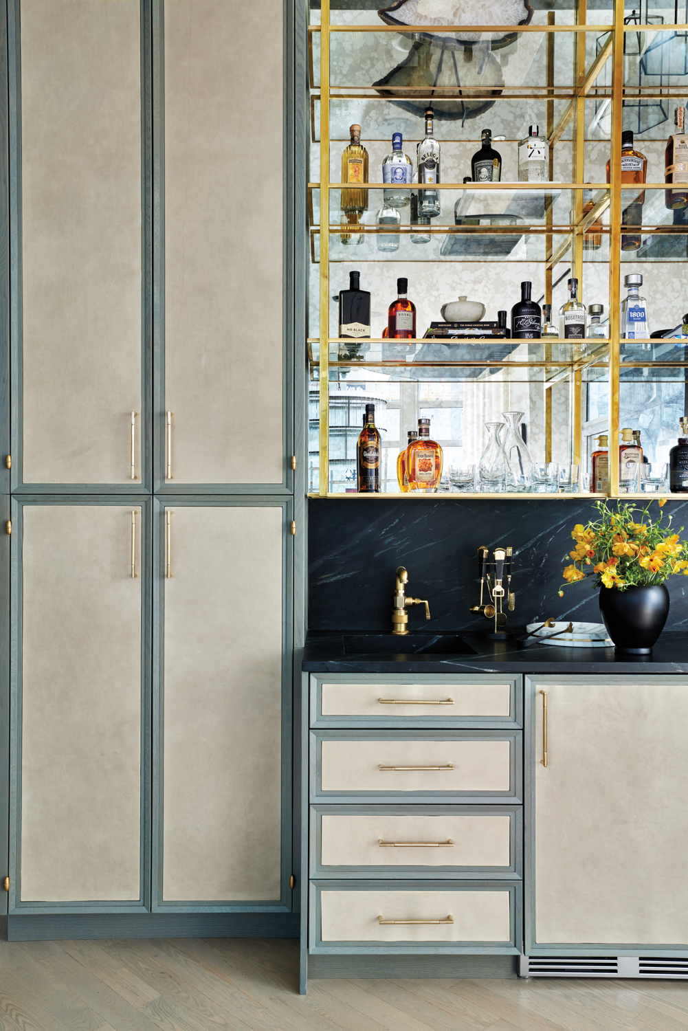 leather paneled home bar with...