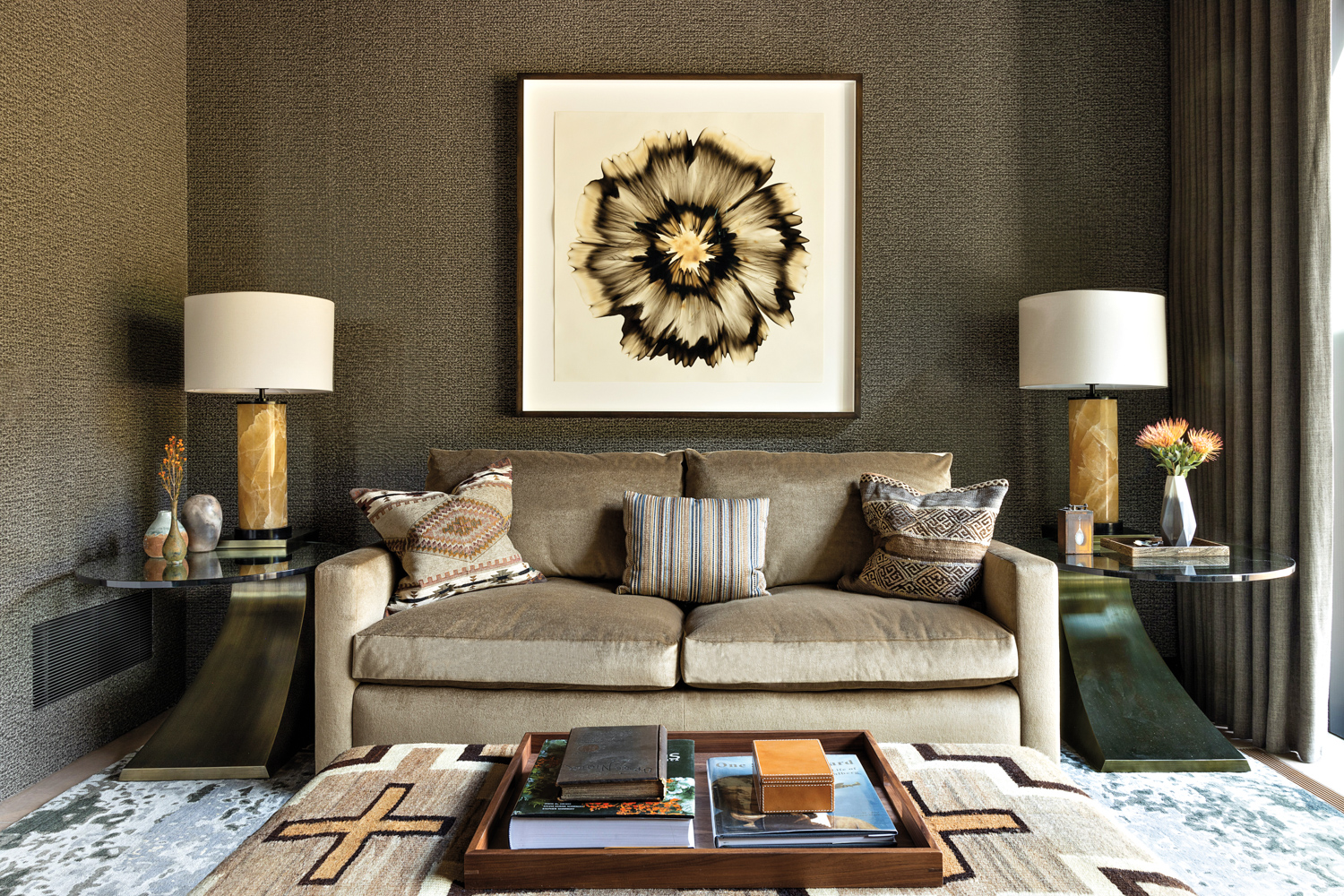 Taupe-colored sofa framed by modern...