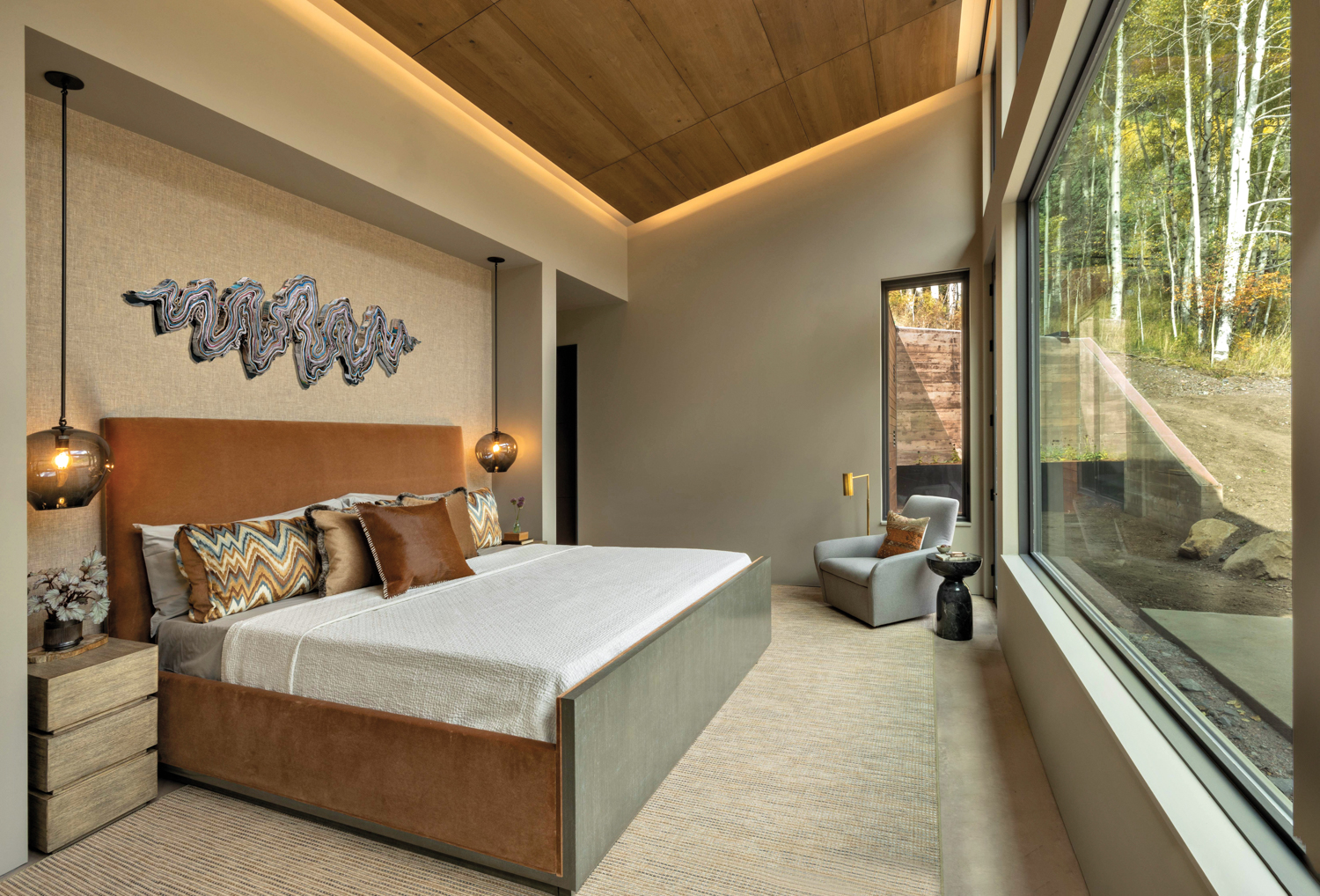 Bedroom with modern, clean-lined bed...