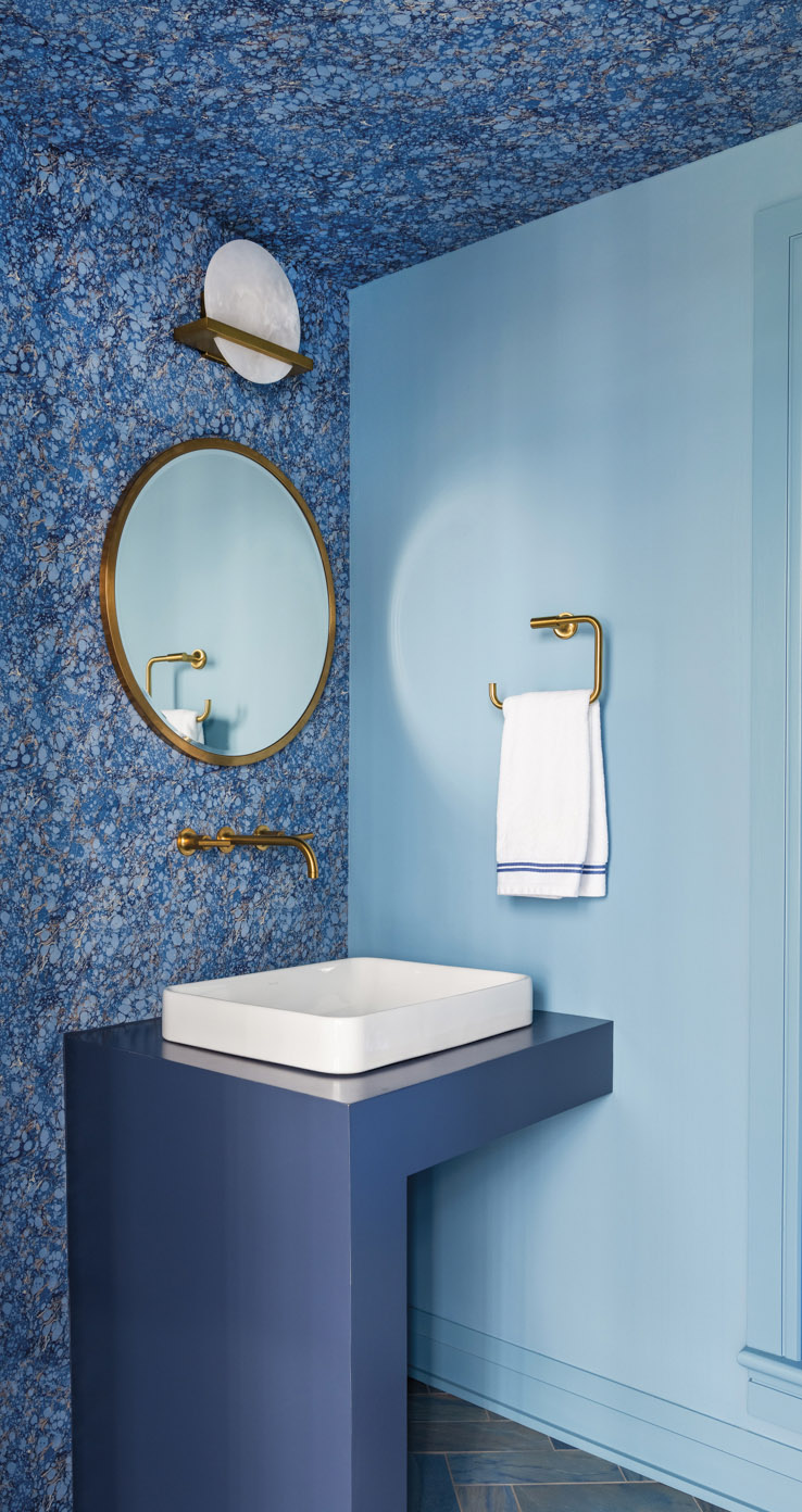 blue bathroom with marbleized wallcovering