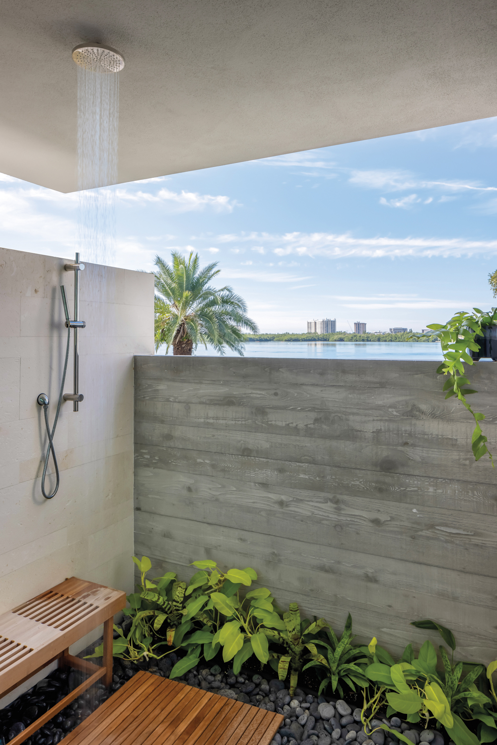 outdoor shower with limestone wall...