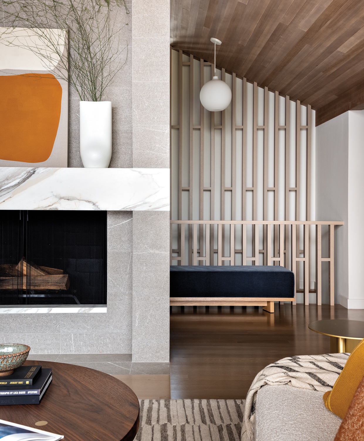 A fireplace and a slatted wall
