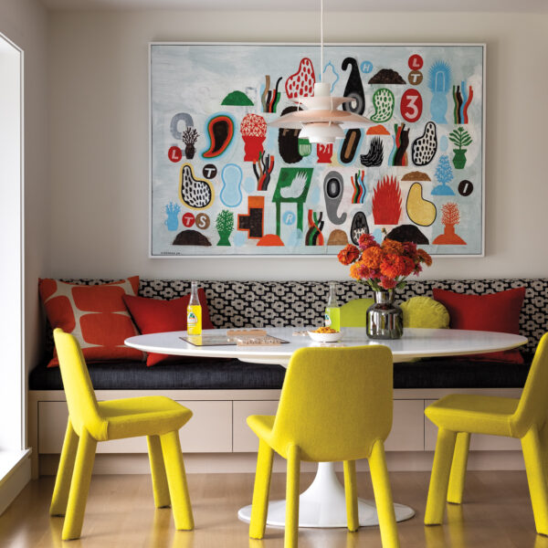Find The Mid-Mod Fun Of Palm Springs In This Seattle Home Midcentury-Modern Breakfast Nook With Yellow Chairs And Banquette With Colorful Art